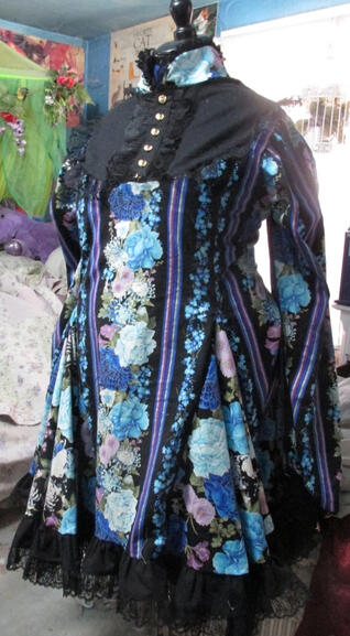 A black, purple, and blue classic lolita dress with stripes and flowers.